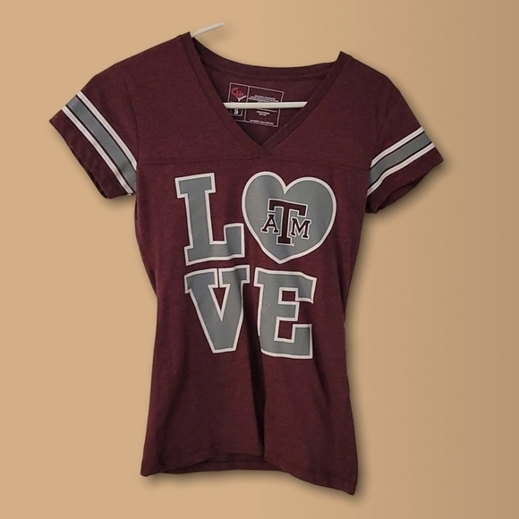 5/$25 Campus HERITAGE Texas A&M Graphic Aggie V-Neck Short Sleeve Baby Tee - Picture 1 of 6